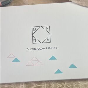 OFRA On The Glow Palette with Pink and Blue Accents